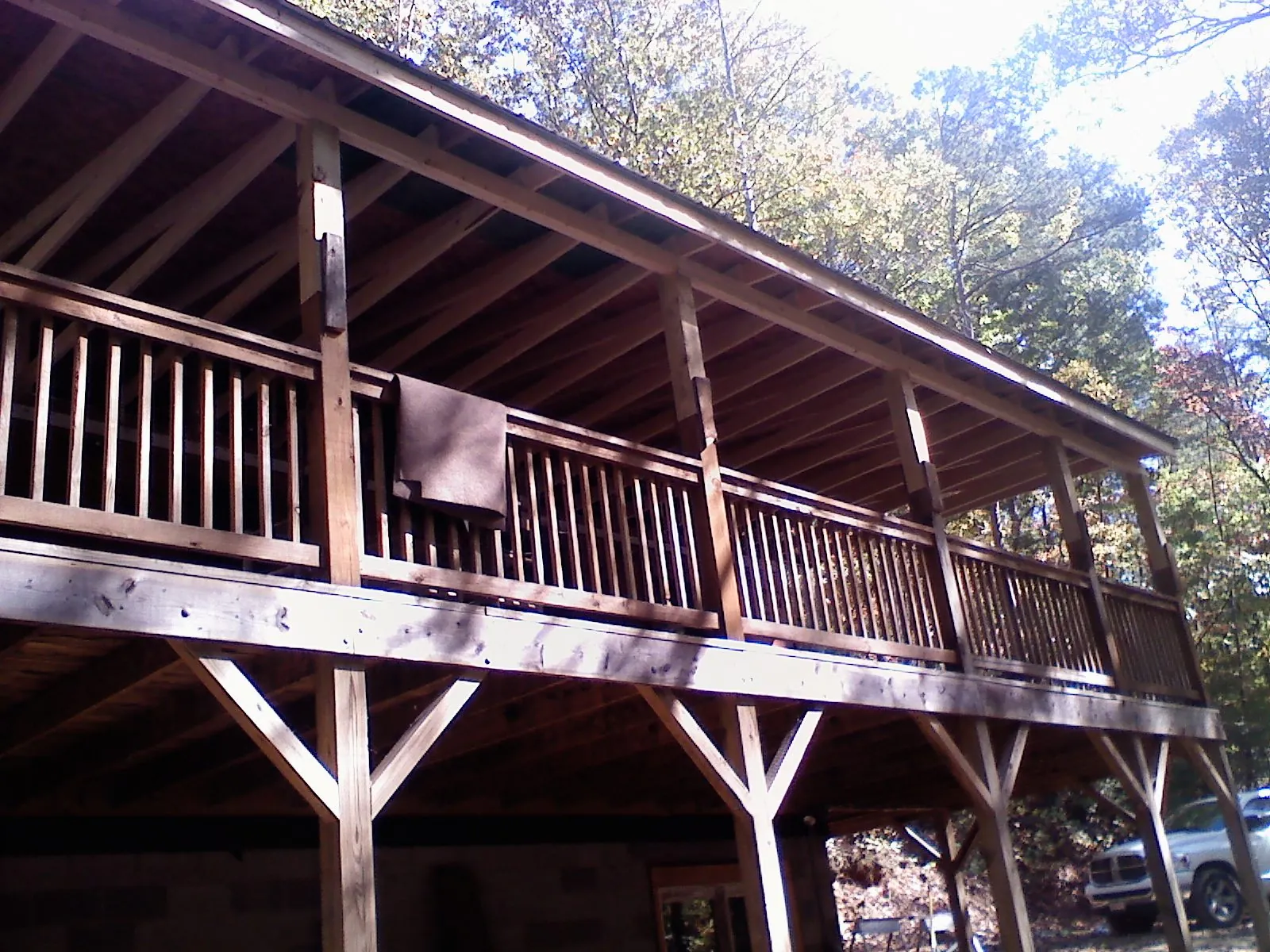 Timber framing under a new elevated porch and deck — Roof Leak Repair in Vermontville by Roofing Brothers